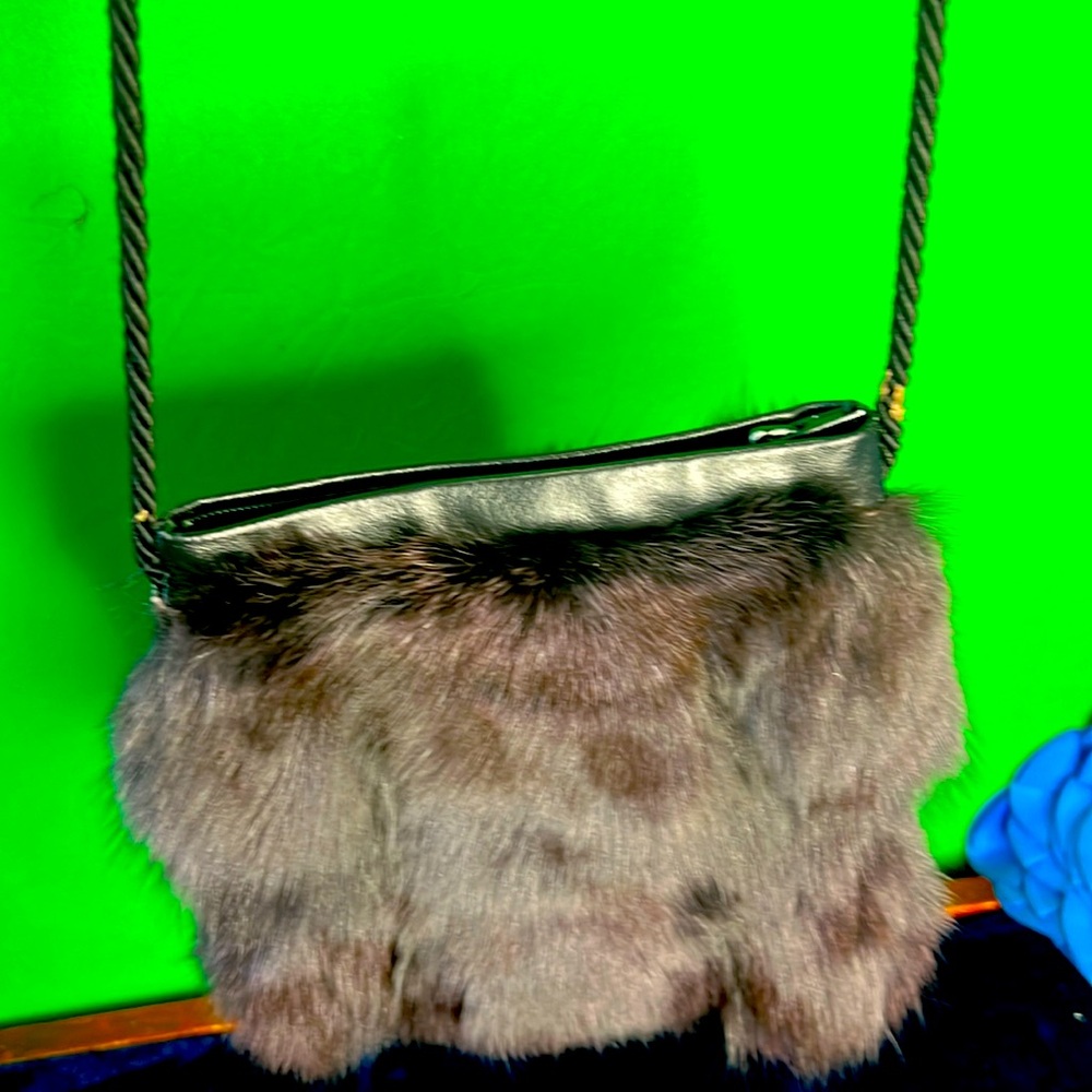 Eggplant purple rabbit fur, mini shoulder purse. Black satin roped  strap